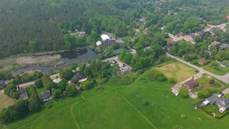 Wildfire smoke over historic Alton Mill surrounded by forest in Caledon, Ontario