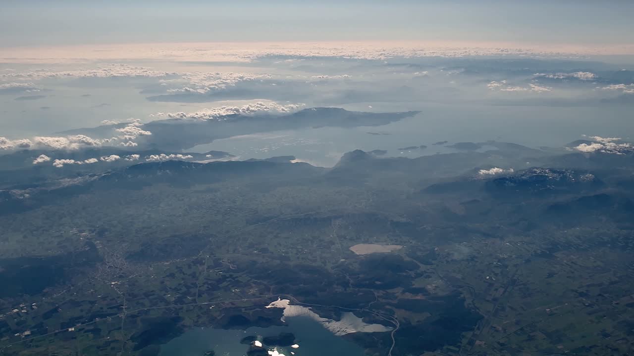 Cinematic wide angle aerial view from airplane of Greece