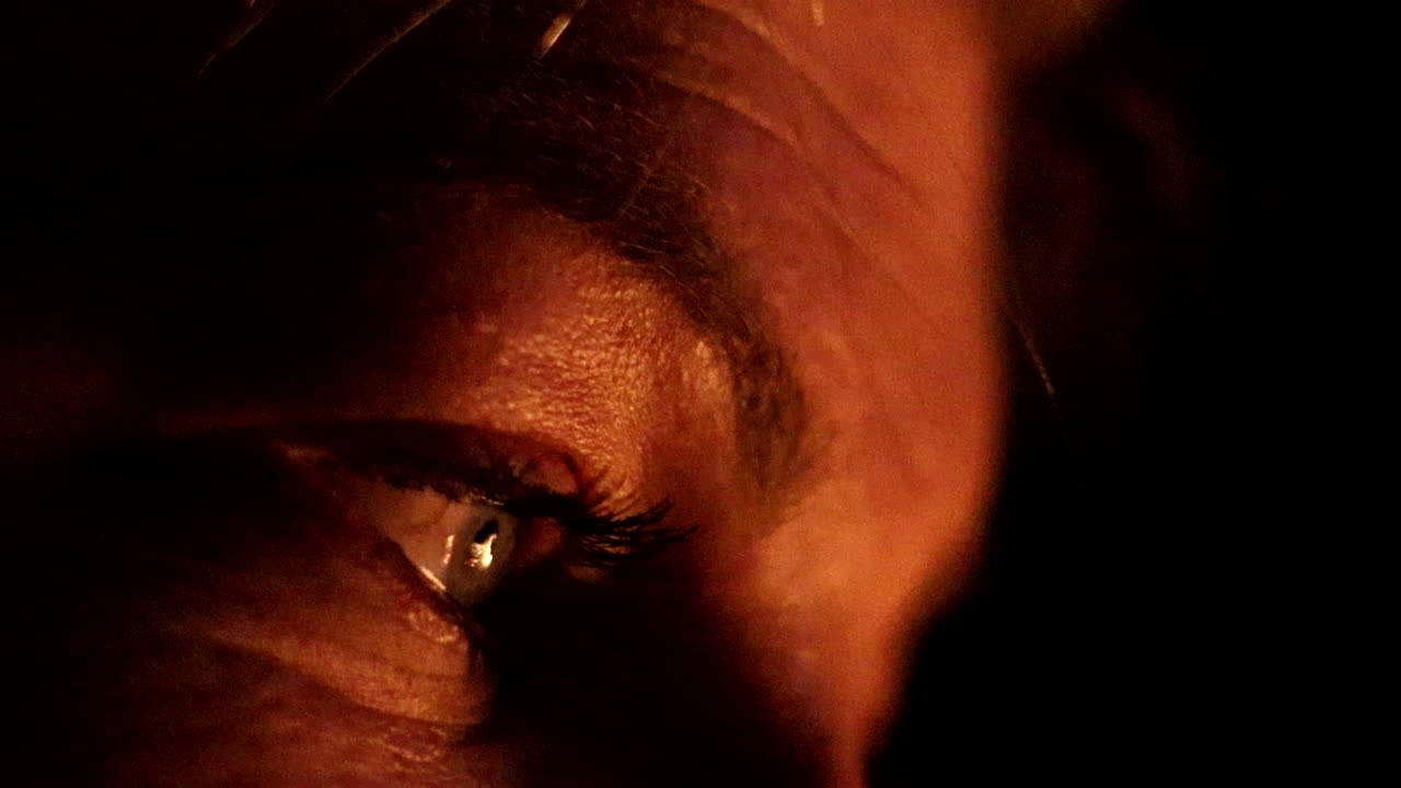 Close Up of a Woman's Eye in Warm Light