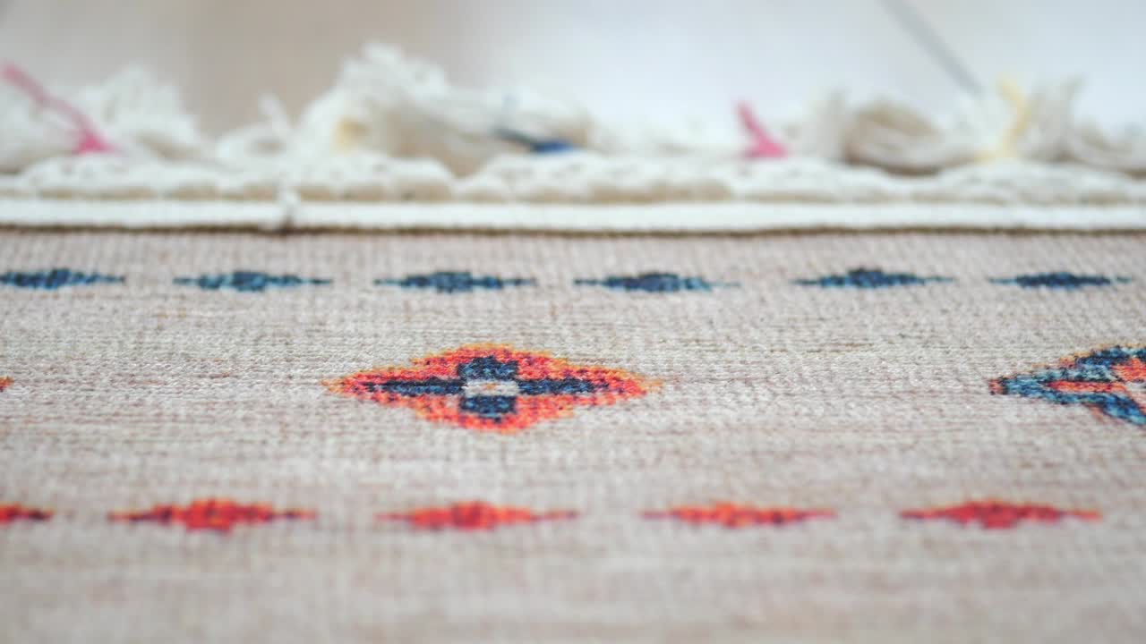 Close-up of a Colorful Woven Rug with Geometric Pattern