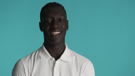 african american man on blue background.