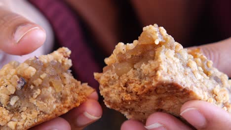 close-up of apple crisp bars being held