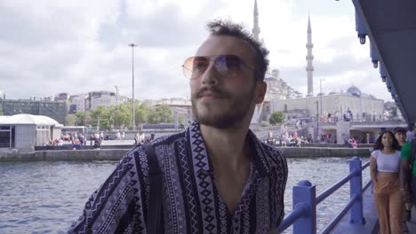 Young-man-by-the-sea-in-Istanbul.