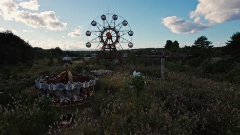 drone fly abandoned ferris wheel park kejonuma leisure land, japan countryside green savage fields, aerial japanese skyline in autumn daylight, tōhoku sendai