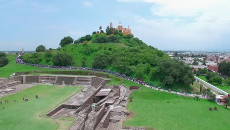 aerial view of a crowd of people at a religious site in mexico