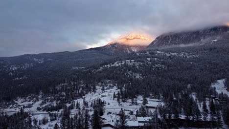 beautiful golden sunset in canadian rocky mountains in winter