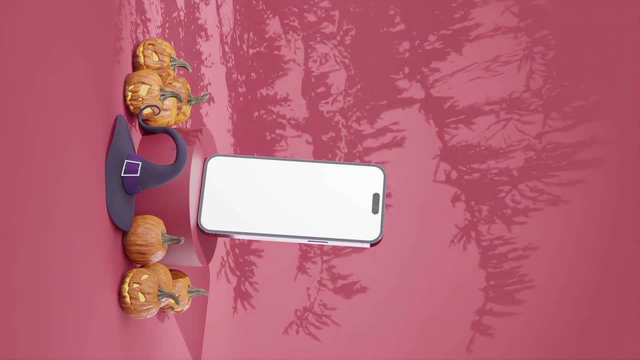 Empty smartphone mockup template with pink background and halloween decoration