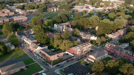 aerial establishing shot of american urban downtown city at magic hour