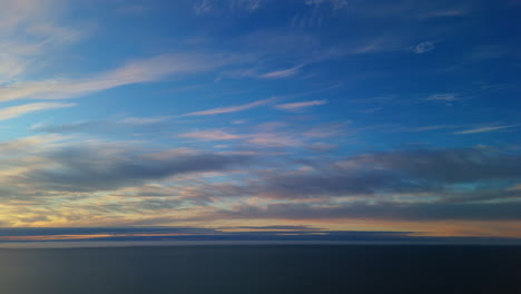 scenic sunset over the sea near tuktoyaktuk in northwest territories, canada. static shot