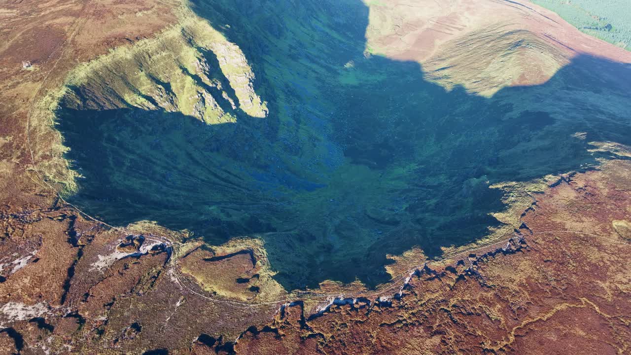 epic Ireland Mountains looking down into Coum Eag Comeragh Mountains Waterford dramatic winter light