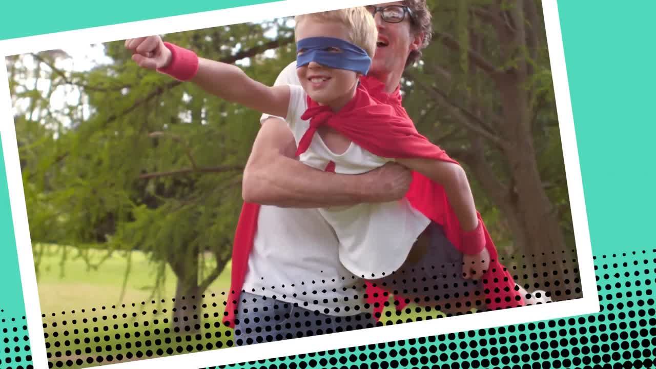 아들을 안고 있는 아버지가 슈퍼히어로처럼 행동하고 있습니다.