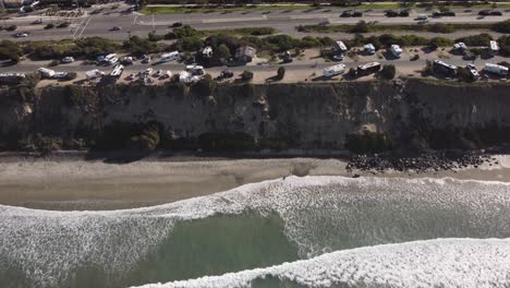 a stunning static aerial drone shot of the coast and beach, carlsbad state beach - california