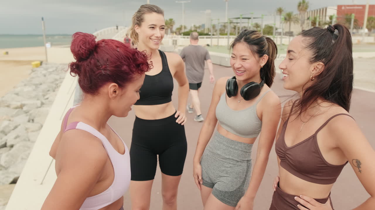 Friends Enjoying Fitness and Beach Life