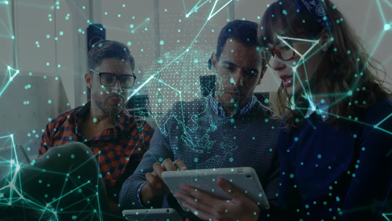 Coworkers reacting to pointing and tapping tablets in lounge exploring tech Asia map overlay