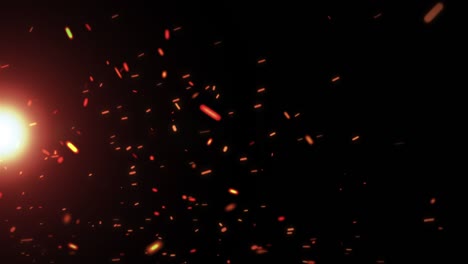 animación de luz de llamarada de color naranja en el centro izquierdo y movimiento de partículas de fuego en fondo negro. fondo. transición. plantilla de fuga de luz flash de bucle 4k.