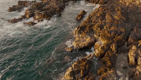 idyllic seascape with rugged coast in costa rica - drone shot