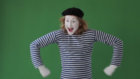 excited mime artist giving thumbs up gesture