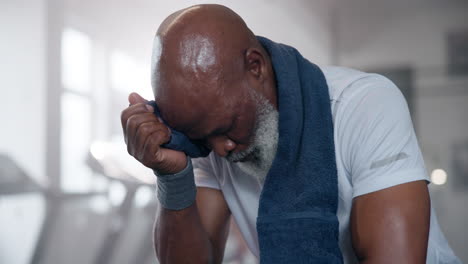 man resting after workout
