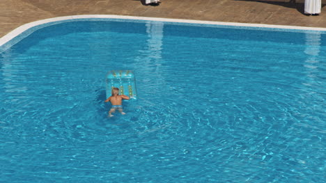 happy children near swimming pool