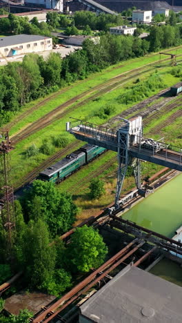 aerial view container freight train. freight train passing to distance at line railway