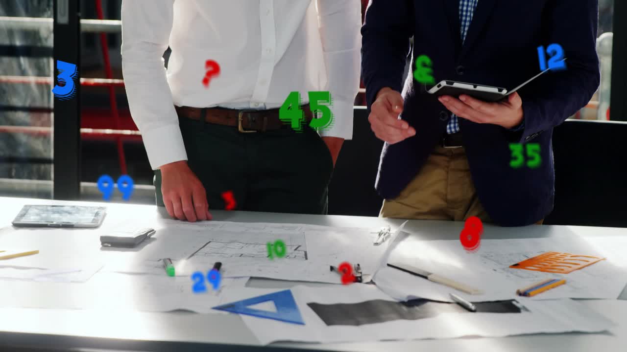 Right man tapping tablet, left man leaning over plans with floating metrics guiding design review