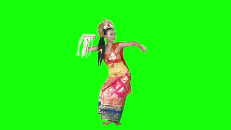 traditional pendet dancer dancing in studio