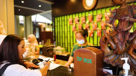 guests check-in at a vibrant hotel reception