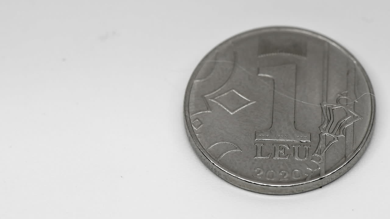 Moldavian one leu coin on a white background. Macro