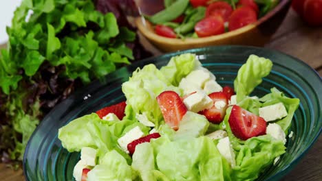 oil being poured in salad