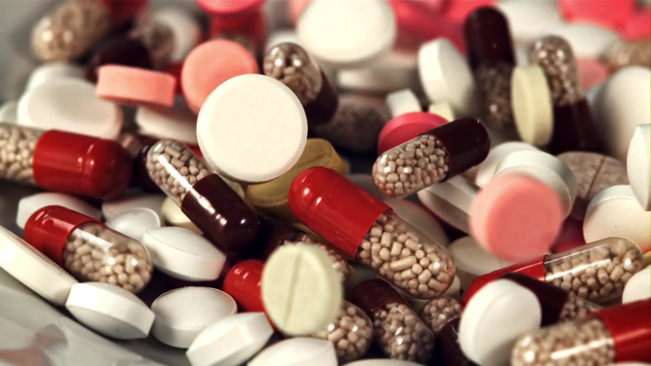 Close-Up of Assorted Pharmaceutical Pills and Capsules Falling