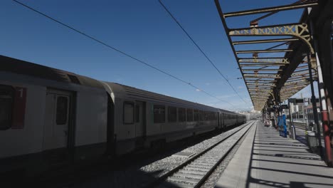still train and arriving train at marseille-st-charles train station in marseille, france