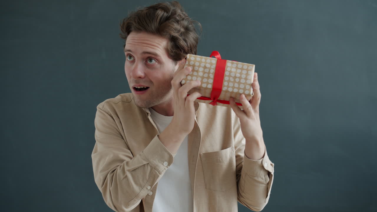Man Excitedly Receiving a Gift
