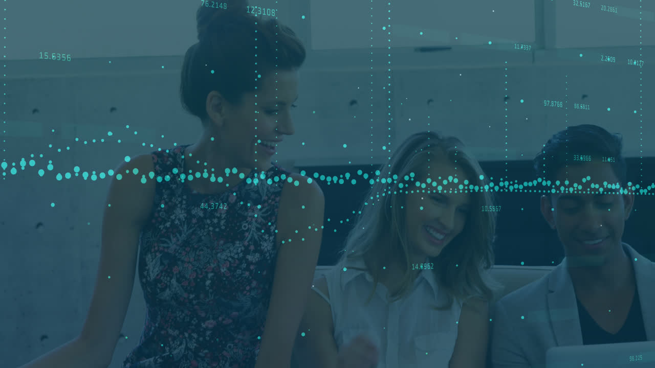 Animation of data processing over diverse colleagues smiling together looking at laptop at office