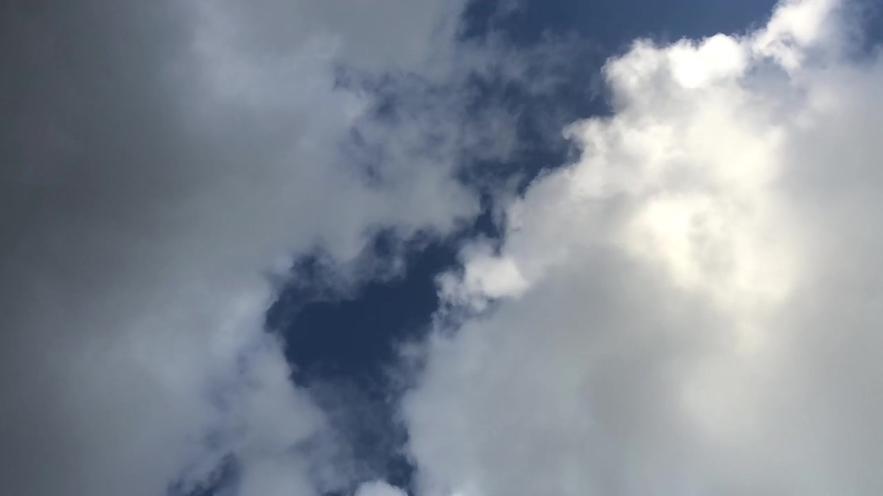 Time Lapse of Dynamic Clouds Moving Across a Blue Sky