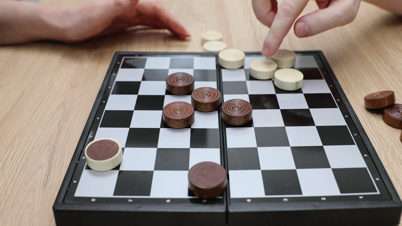 Checkers Game on a Checkered Board