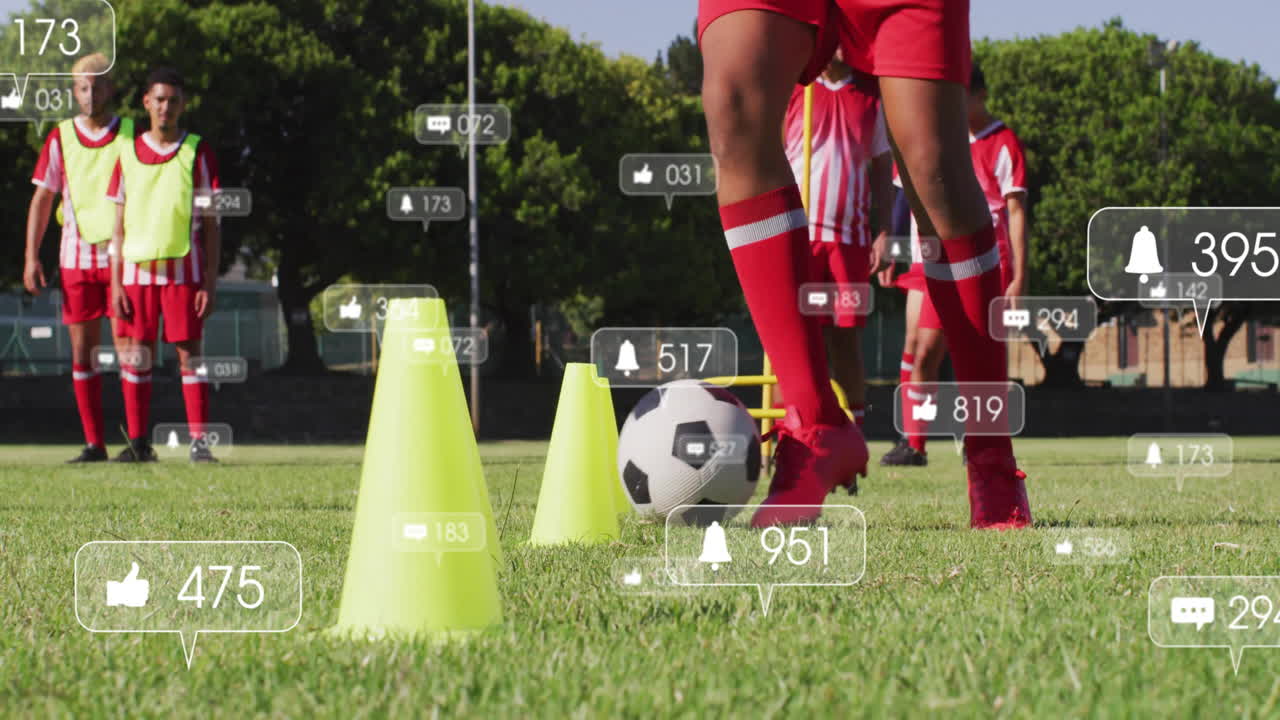 Practicing soccer on grassy field, players with social media animation overlay