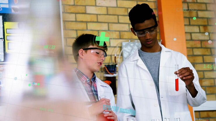Left student talking, holding flask; right lifting test tube while overlays marking lab results