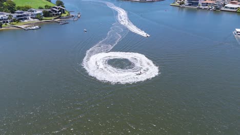 jet skis creating circular patterns on water