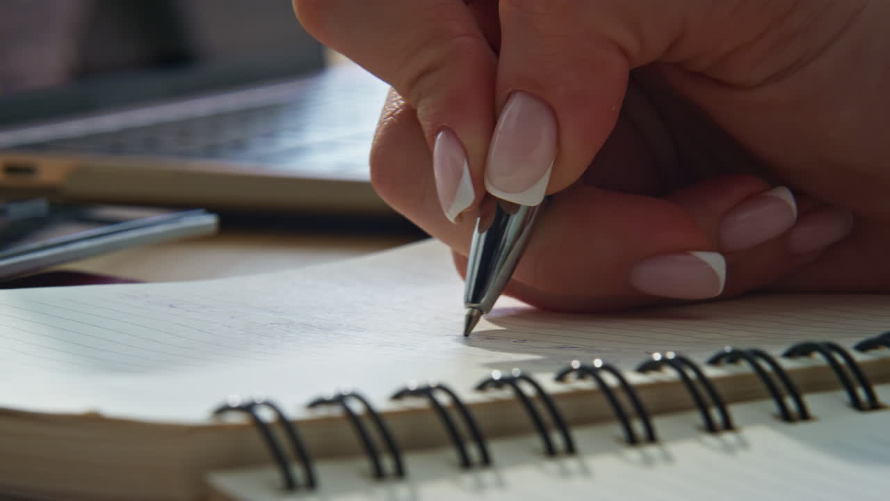 Copywriter hands noting copybook working at home closeup. Businesswoman writing