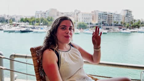 after the beach: sunburned woman at cafe