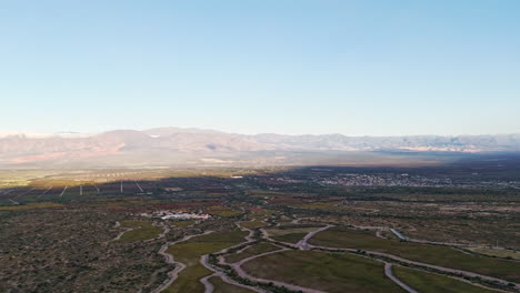 Hyperlapse-of-the-city-of-Cafayate,-Salta,-Argentina,-showing-shadows-creeping-into-the-valley-at-sunset