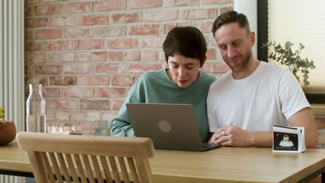 Couple-doing-videocall-on-the-table