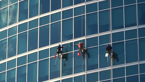 the window washers on the skyscrapers at work,