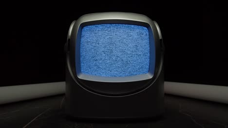 retro tv, vintage television in a nostalgic setup, a retro tv displays grain on screen, scary halloween night device good for chroma key and green screen. high quality 4k footage