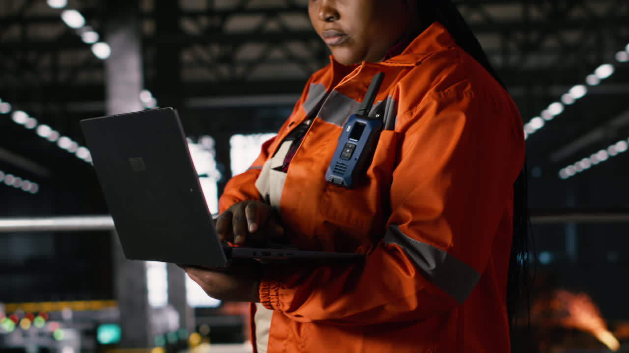 Engineering specialist, black woman, monitoring production process