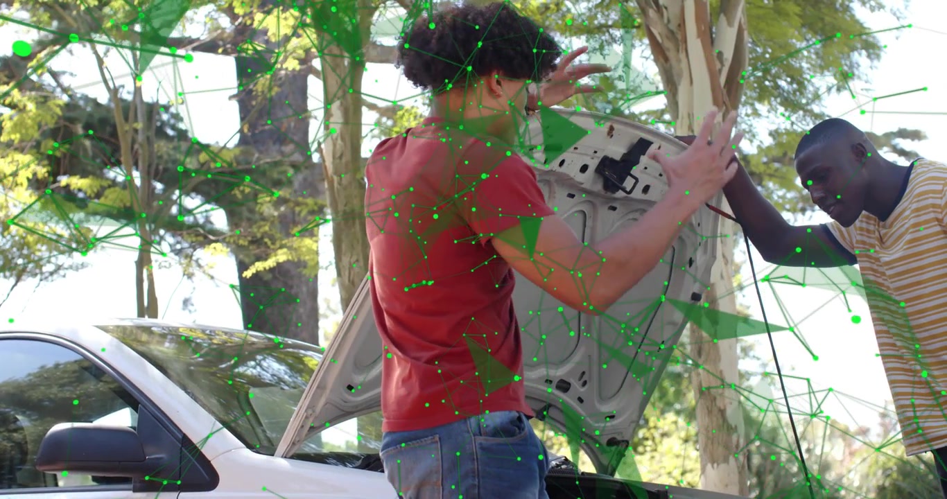 Man in red opening hood and man in yellow steadying hood inspecting car engine for troubleshooting