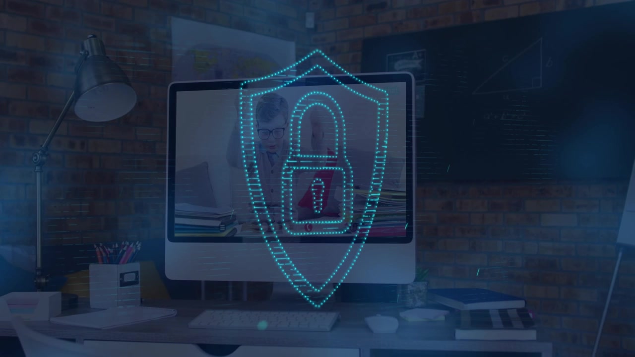 Animation of padlock icon and light trails over caucasian schoolboy on computer screen