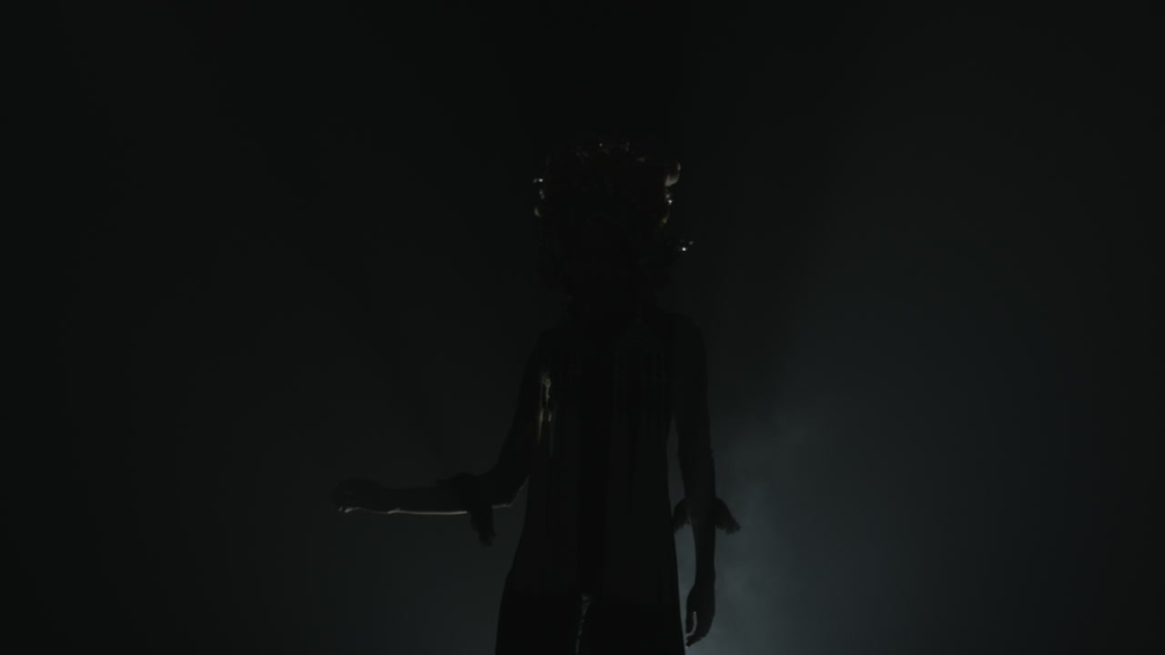 women slow dancing in the dark