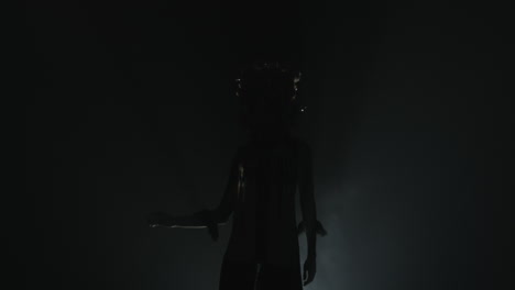 women slow dancing in the dark