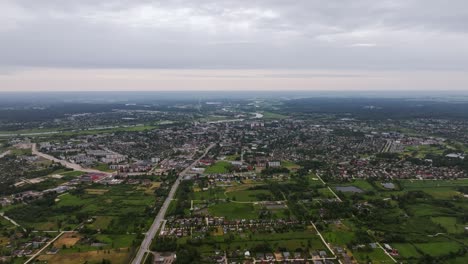 rightward aerial slide over jelgava during cloudy summer morning in latvia